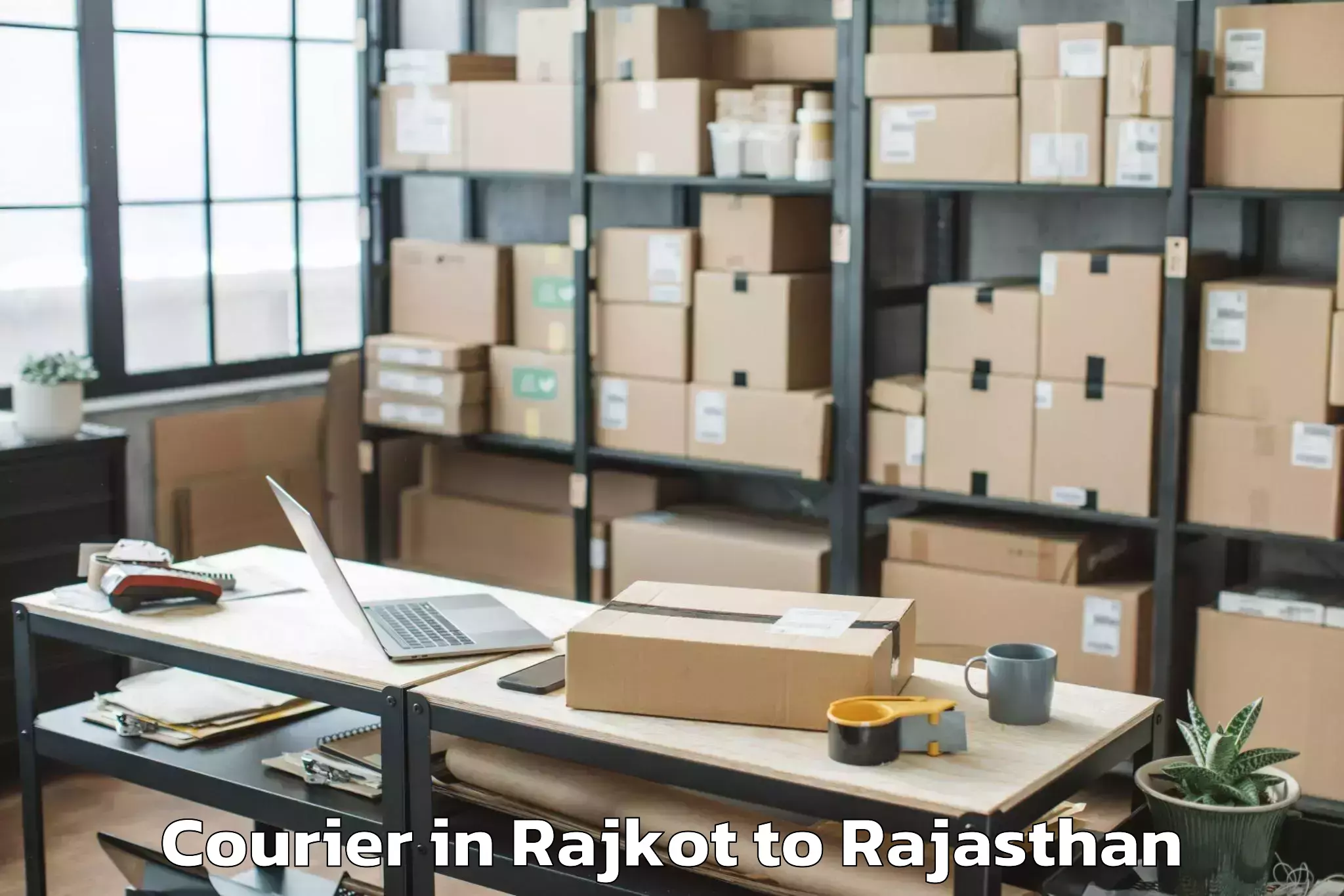 Reliable Rajkot to Maharaja Surajmal Brij Univers Courier